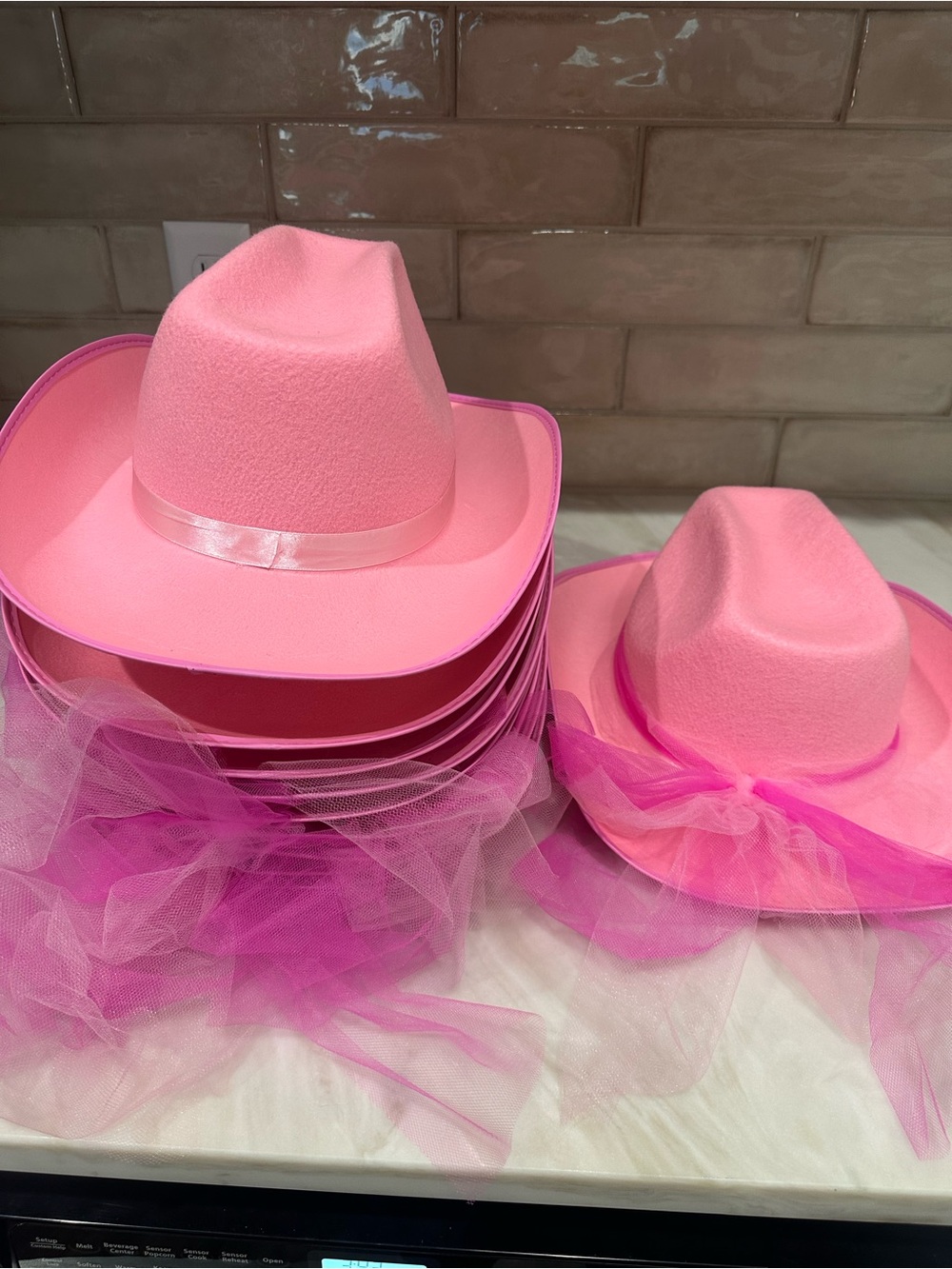 11 pink cowboy hats